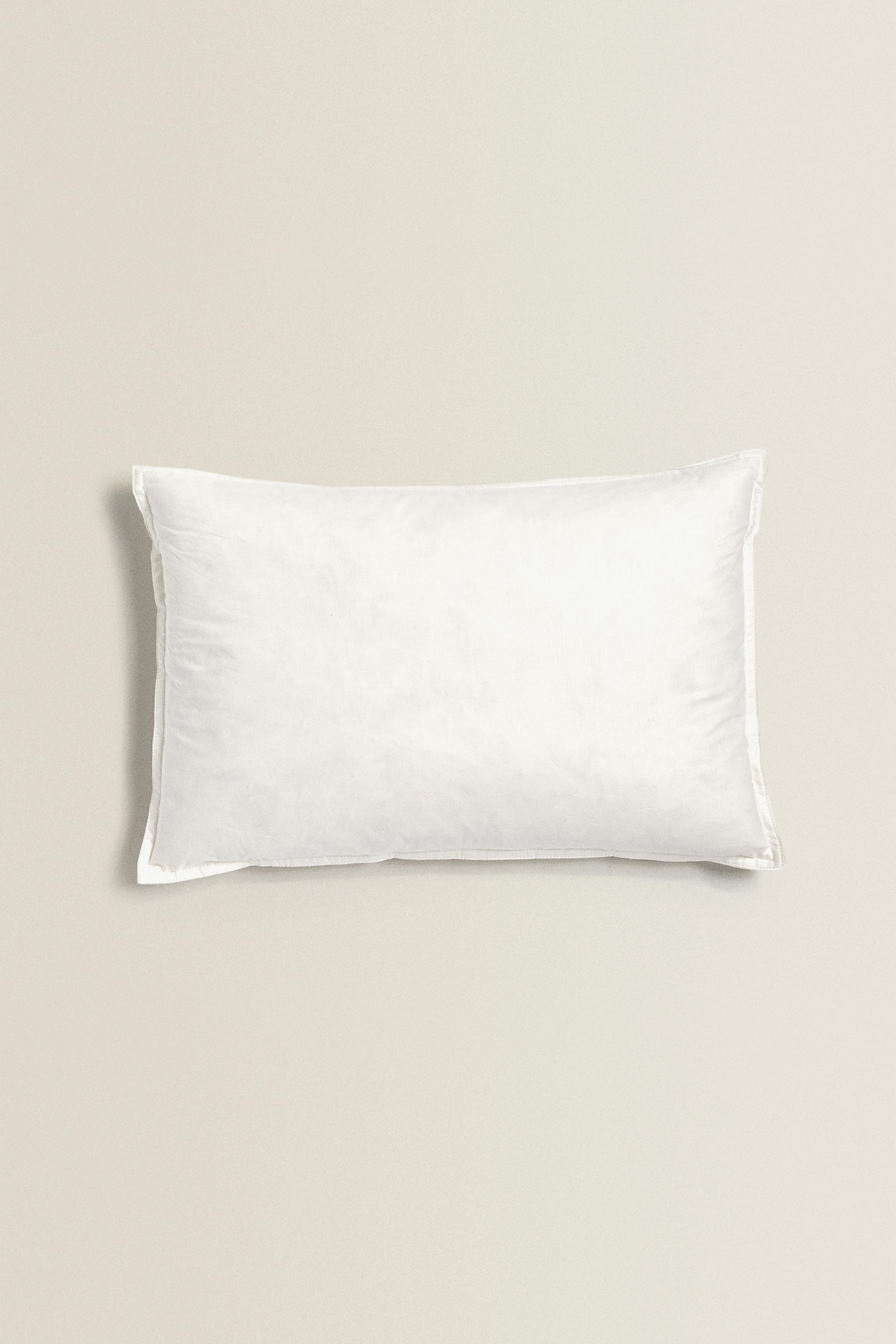 FEATHER CUSHION FILLING WITH A COTTON COVER